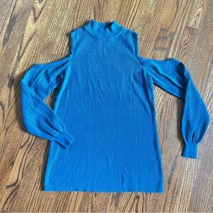 Cyrus shoulders out dark teal sweater